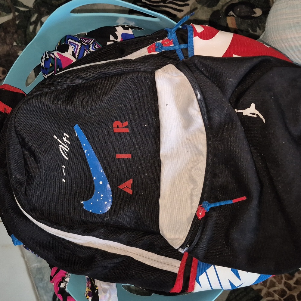 Nike Air Black Backpack with Red and Blue Highlights